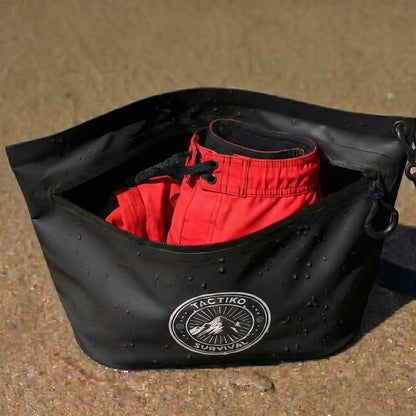 Waterproof pouch holding wet clothes